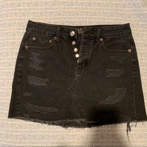 Black denim ripped skirt 🤎